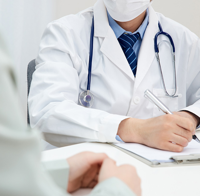 Physician consulting with a patient